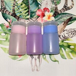Set of Three Pink, Purple, and Blue Pump Dispensers